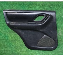 Обшивка двери задняя левая Ford Maverick 2001-2007 б/у Обшивка двери задняя левая Ford Maverick 2001-2007 б/у
