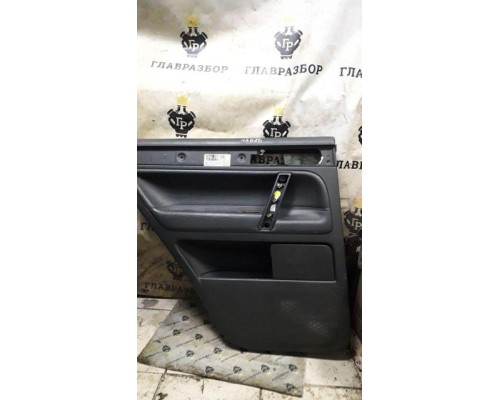 Обшивка задней левой двери VW Touareg 2003-2010 б/у Обшивка задней левой двери VW Touareg 2003-2010 б/у