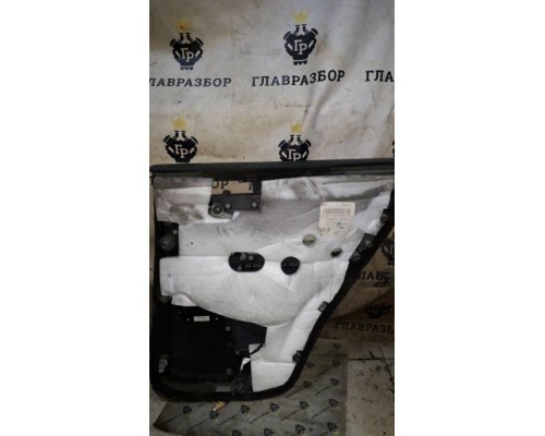 Обшивка задней левой двери VW Touareg 2003-2010 б/у Обшивка задней левой двери VW Touareg 2003-2010 б/у