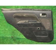 Обшивка двери задней левой Ford Fusion 2002-2012 б/у Обшивка двери задней левой Ford Fusion 2002-2012 б/у