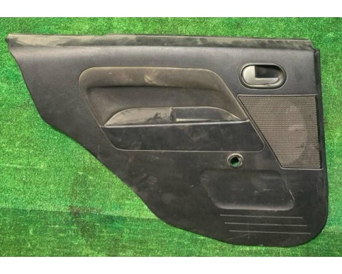 Обшивка двери задней левой Ford Fusion 2002-2012 б/у Обшивка двери задней левой Ford Fusion 2002-2012 б/у