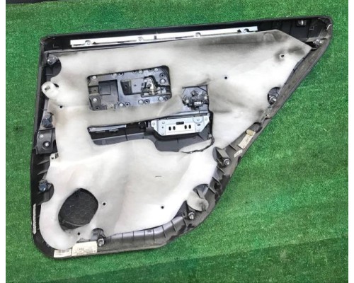 Обшивка двери задней левой Cadillaс SRX 2003-2009 б/у Обшивка двери задней левой Cadillaс SRX 2003-2009 б/у