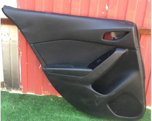 Обшивка двери задней левая Mazda 3 (BM) 2014> б/у Обшивка двери задней левая Mazda 3 (BM) 2014> б/у